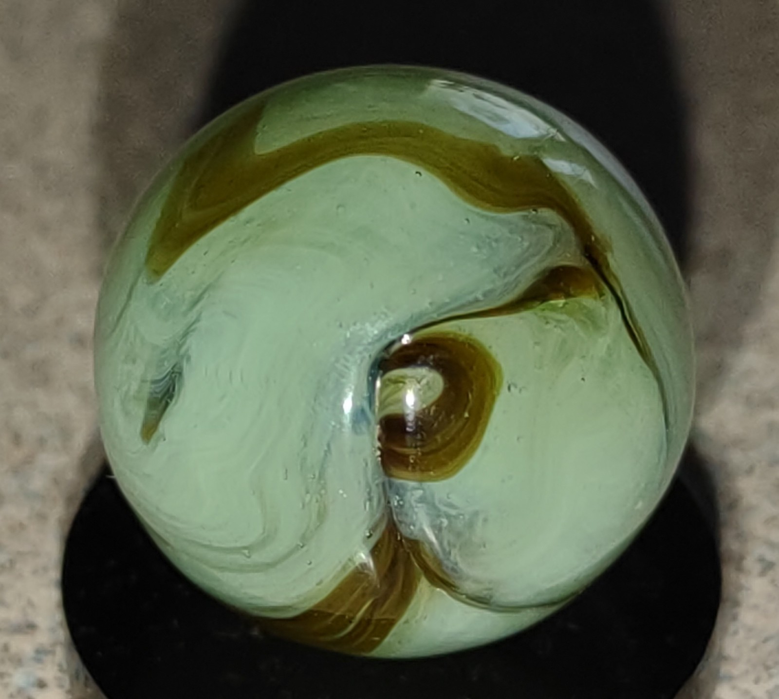 Heaton Agate Swirl marble-.63″ Near Mint+, Lt Green Transl. base-Brown swirl