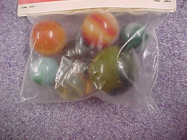 Bag of Coca Cola 43 Annual Tournament marbles.New old stock see photos
