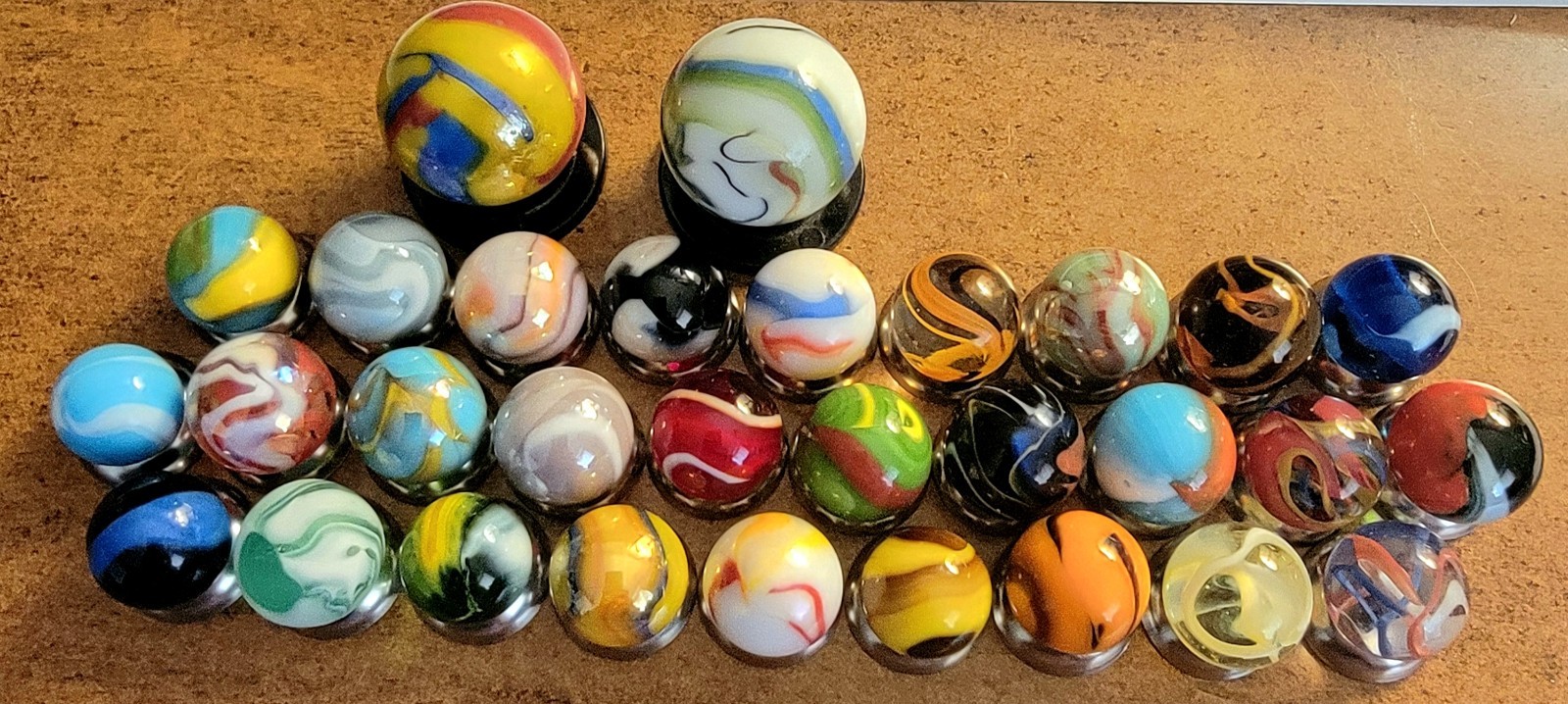 30 Vintage No longer Manufactered MEGA MARBLES With 2 Shooters. WET MINT