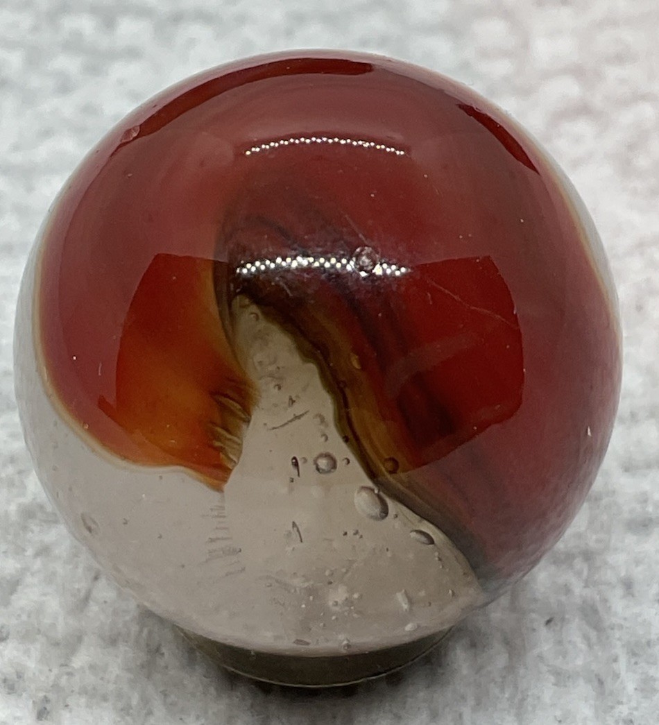 A Vintage Akro Agate Corkscrew Marble. It Measures .95” Near Mint Condition