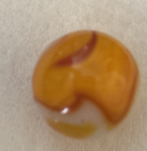 Yellow orange & white swirl machine made marble collectible