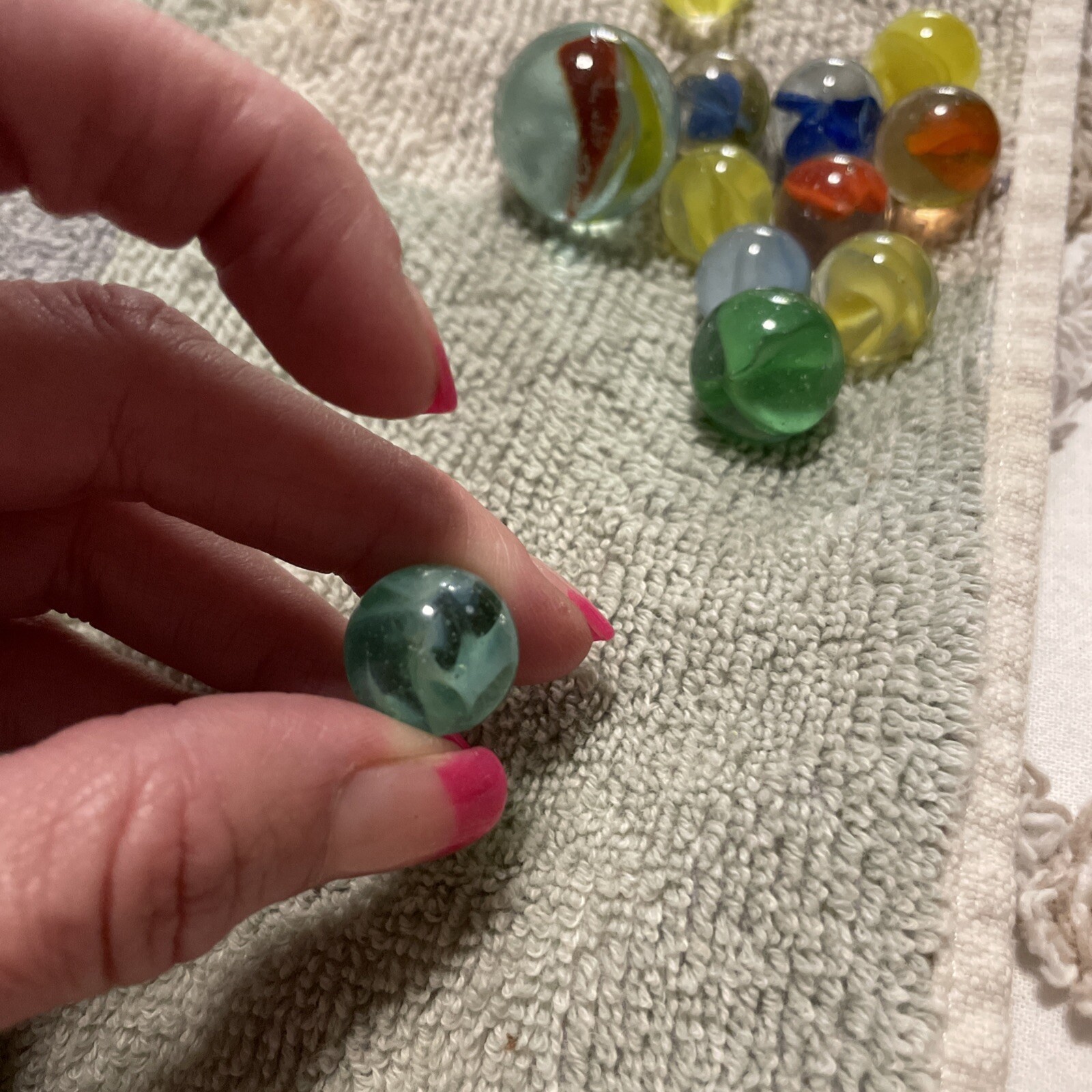 1930-1940’s cat eye 4 vein marbles. Total 12, 1 In, .75 , 10 .50