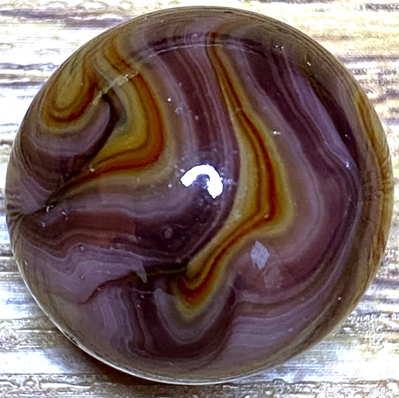 DAS/JABO INTERESTING OXBLOOD & OTHER REDS SWIRLED SHOOTER .72″ M737
