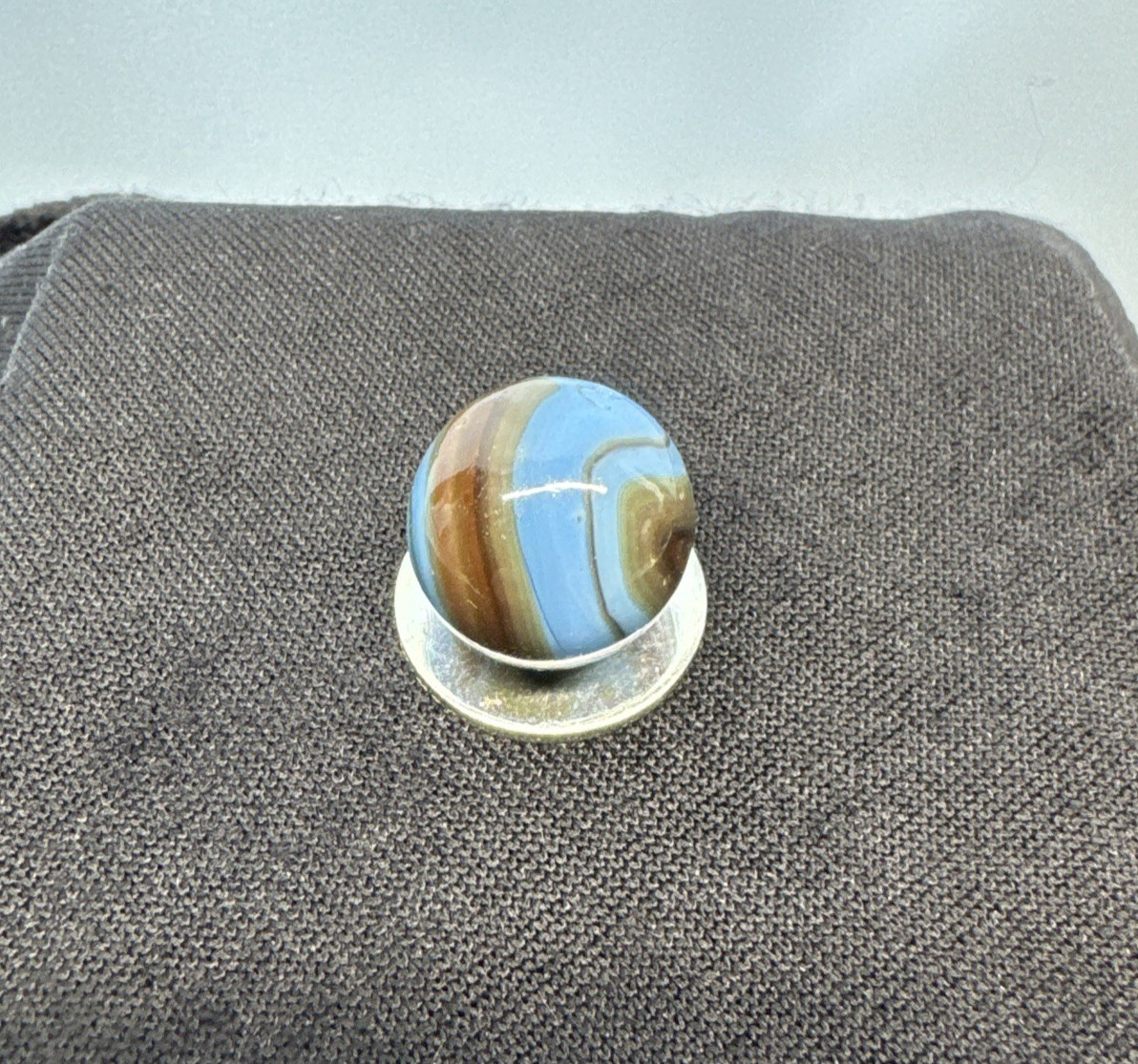Christiansen Agate Opaque Blue Base With Brown Swirls..63″ Wet Htf Brown