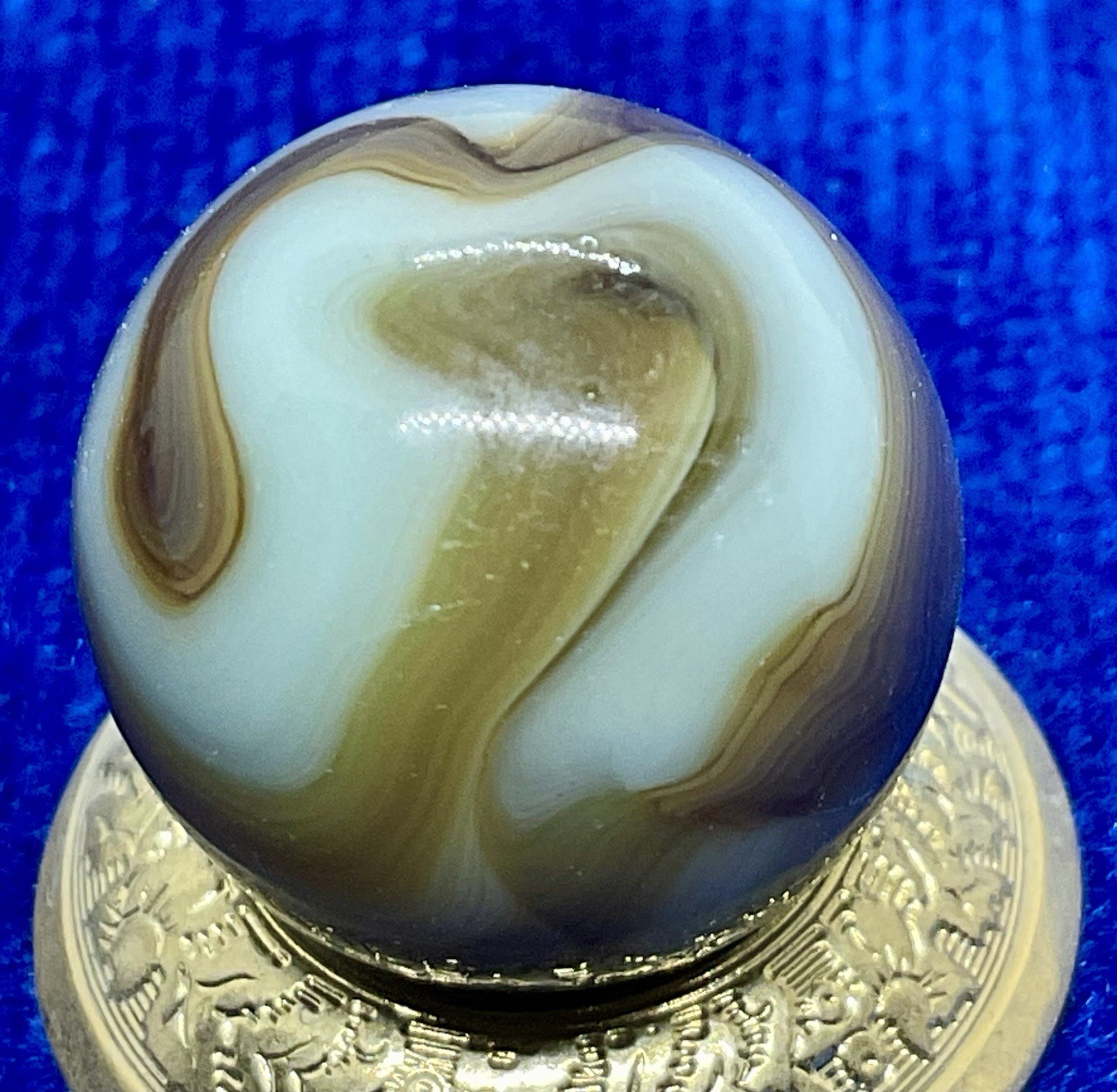 A Vintage Alley Agate “Pistachio” UV Marble. Measures .66” Mint Condition.