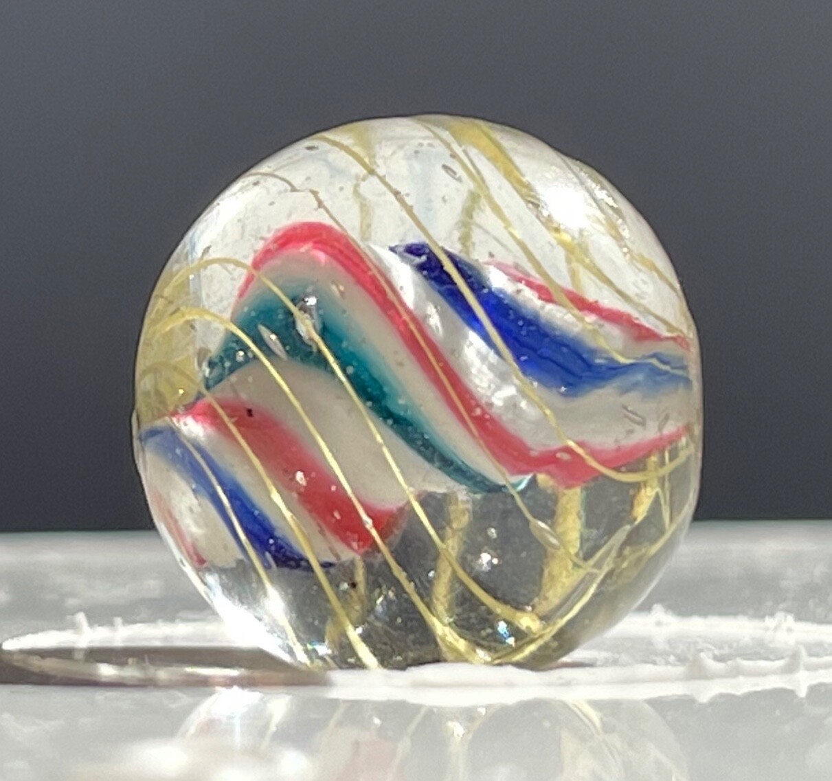 Twisting Red/Blue/Green On A Solid White Core Marble 16mm (5/8”)