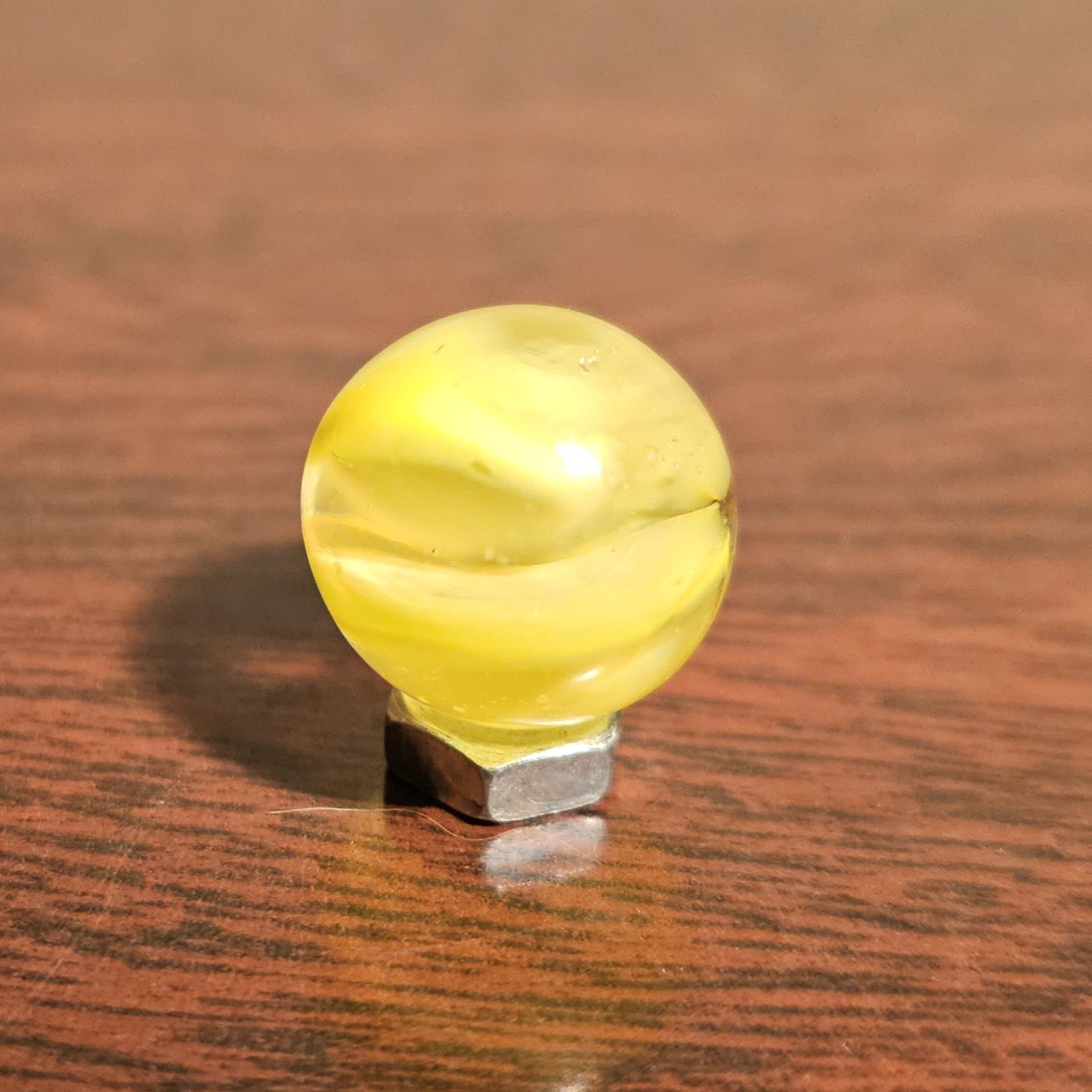 C E Bogard Yellow Cadmium Glow 4 Lobe Cats Eye Clear Glass .593 Marble