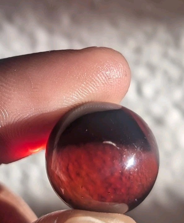 UV Reactive Cadmium Red Clearie Vintage Glass Marble .61 Orange Swirl Glow