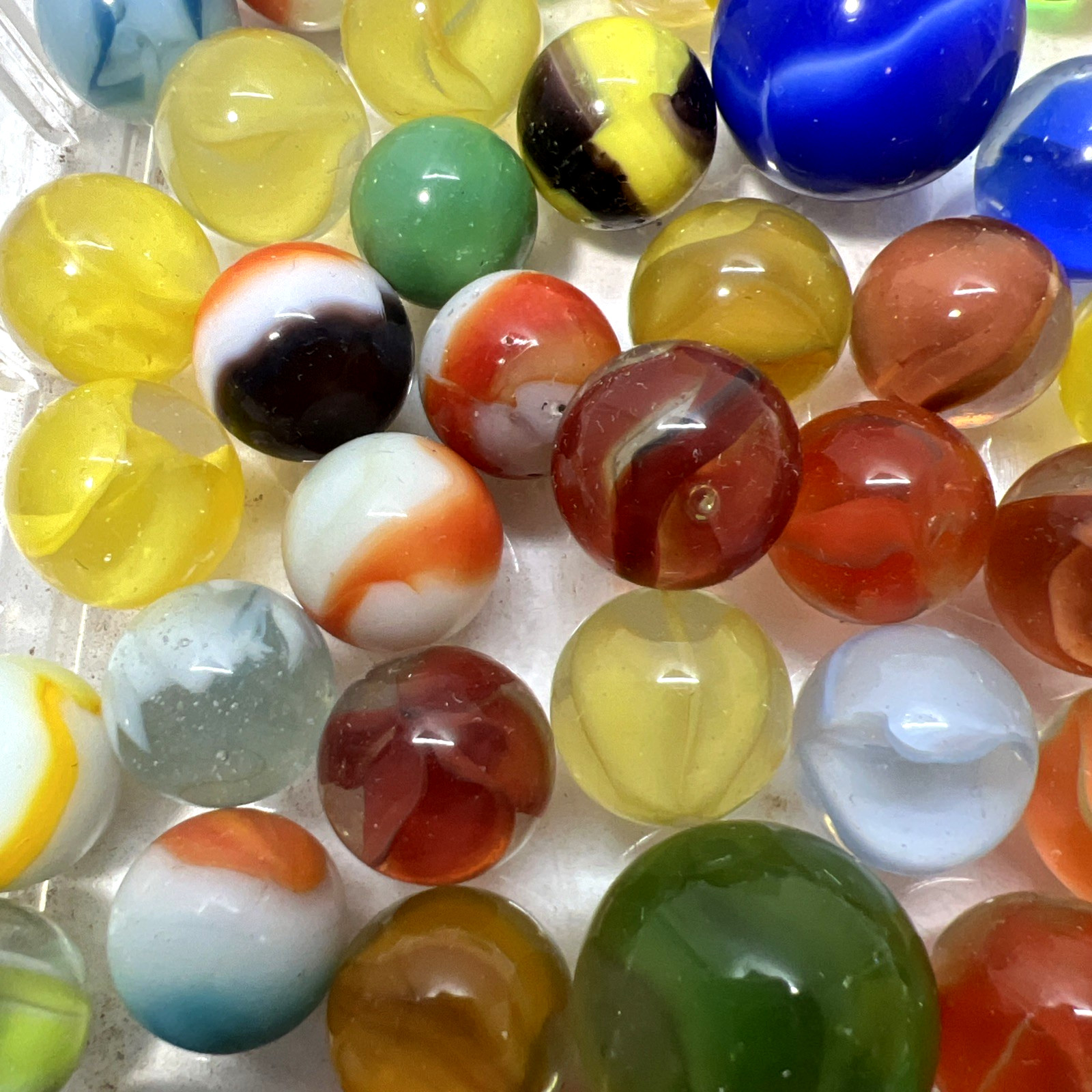 Estate Item: Antique Vintage Lot Of Clear/Swirl Glass Marbles 54 Pc Lot #1