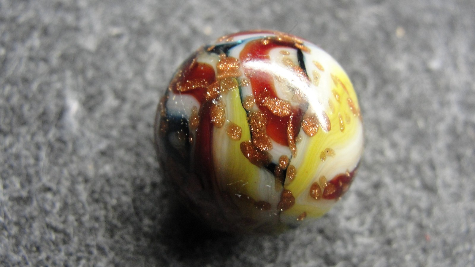 WVMCC marble covered in GOLD LUTZ w/ blue aventurine made 4/26/11 j12b