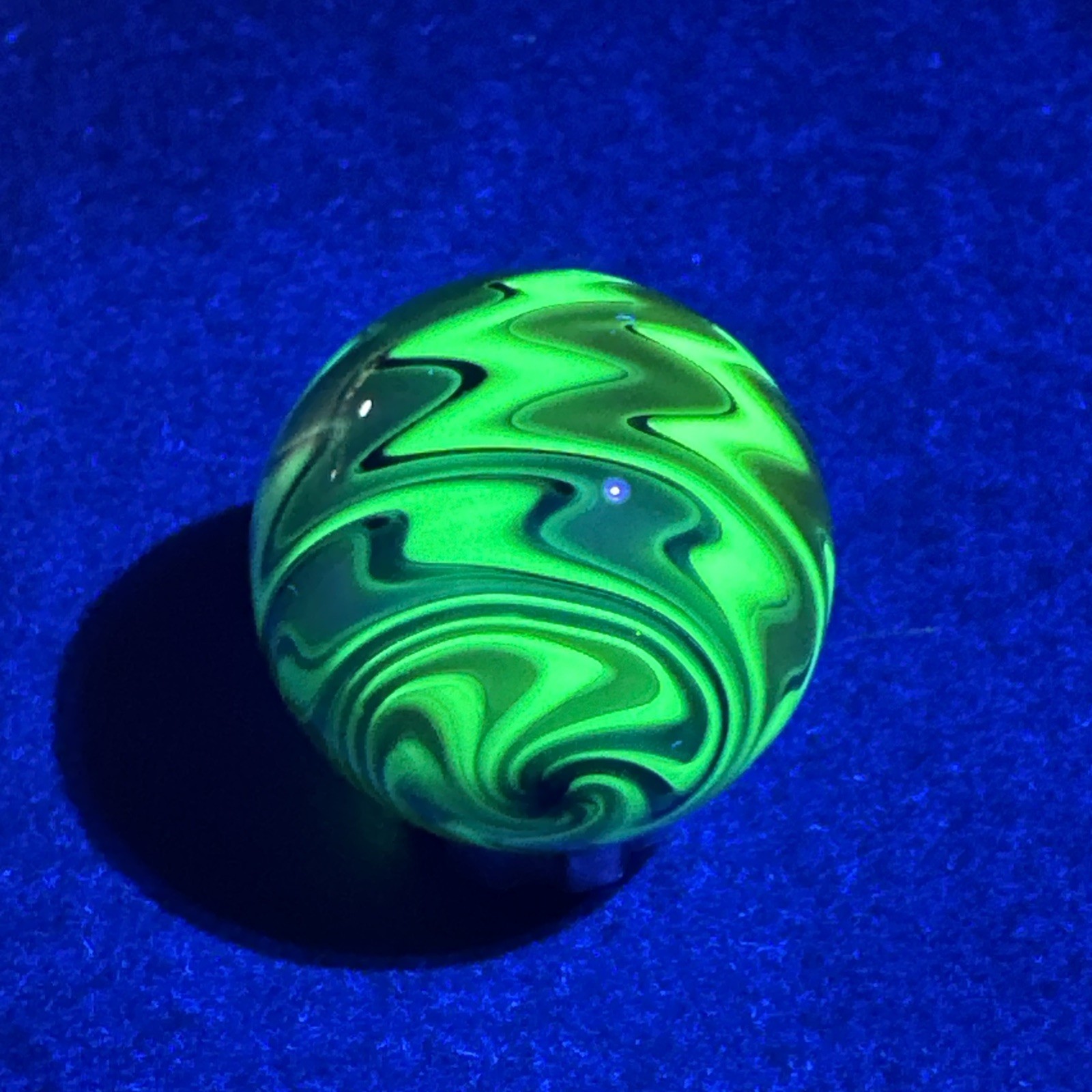 Contemporary Art Glass Marble 1.08″ Wavy Fumed Wigwag W/ UV Reactive Green Glow