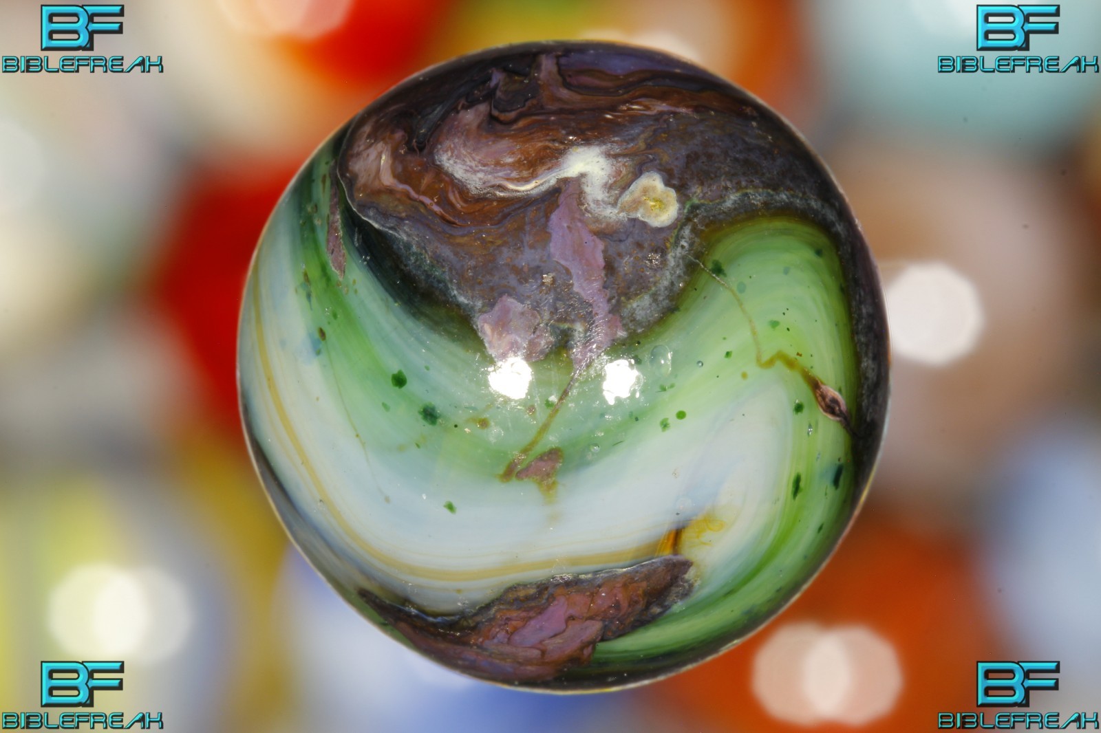 001619 One (1) 2008 JABO Peltier Mansion Run 47/64″ 18.60mm Silver Strike Marble
