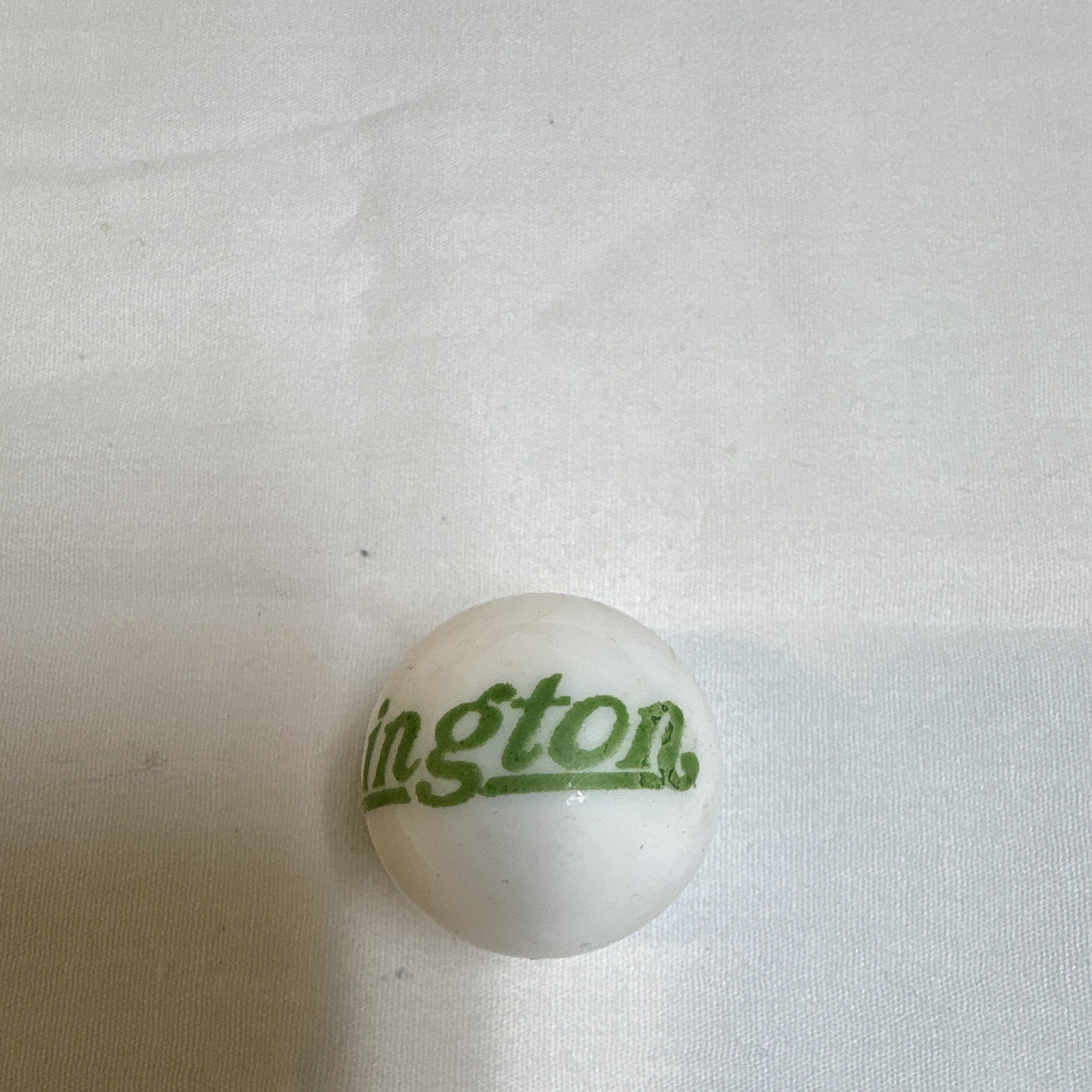 White Logo Printed Toy Marble w/ Green “Remington” Text, Machine Made