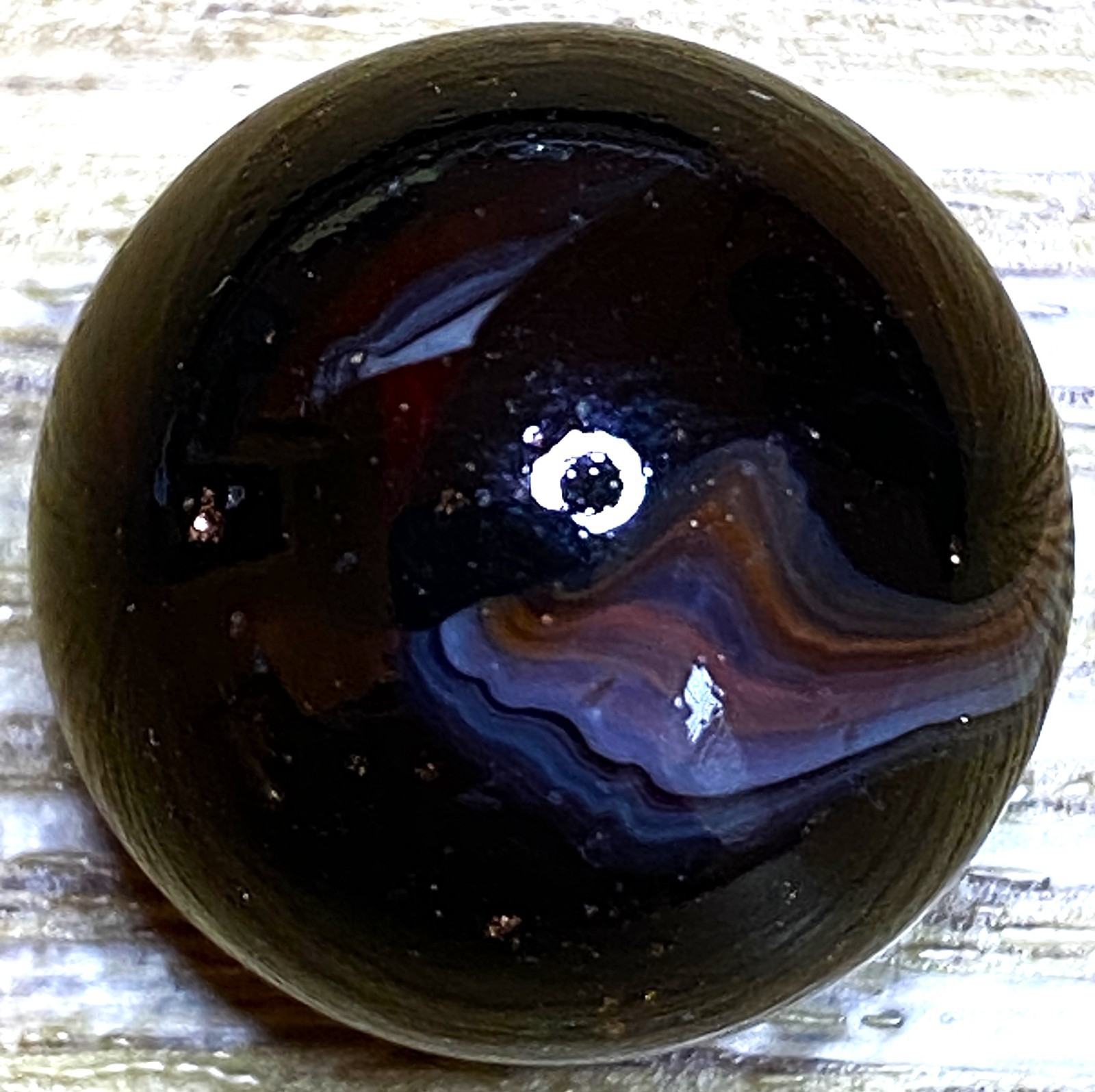 DAS/JABO ASUPER DARK CHERRY WITH LUTZ TRANSLUCENT SWIRLED SHOOTER .72″ M851