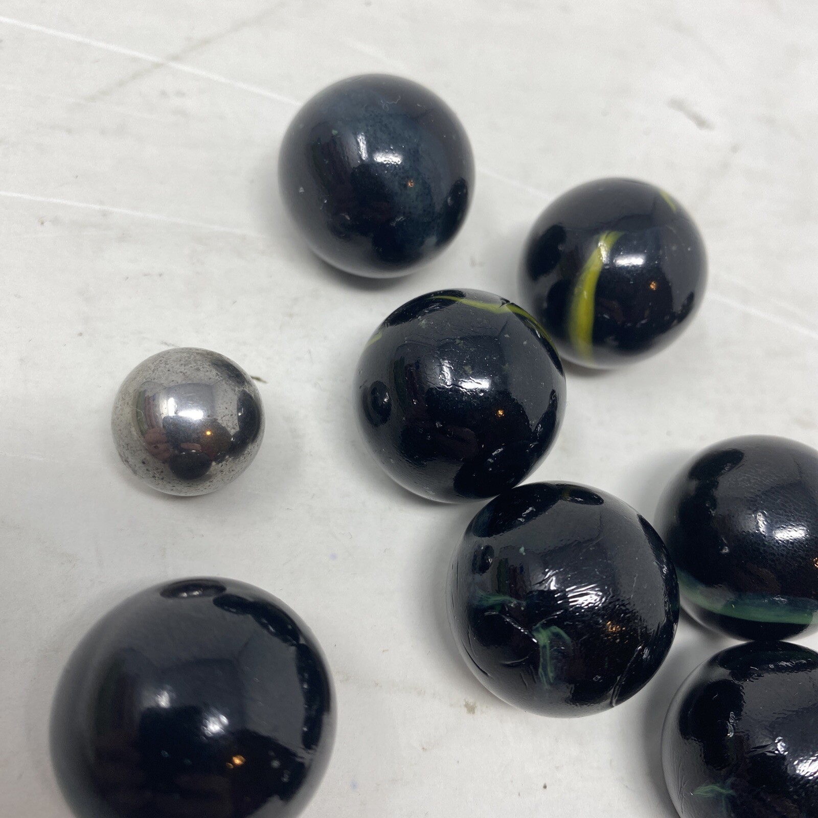 Lot Of 11 Vintage Marbles Black With Green/Yellow Color Swirl