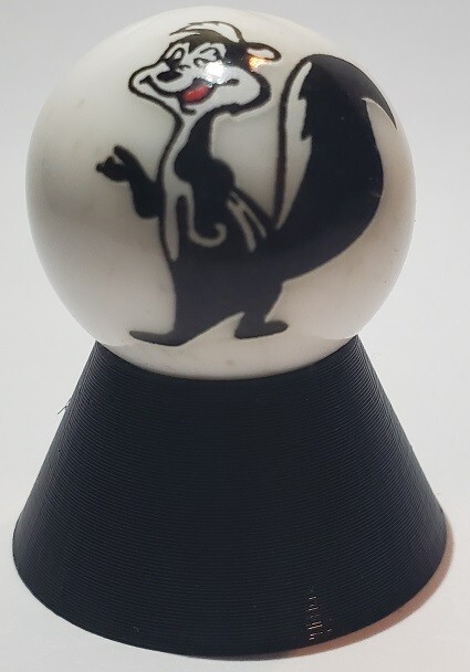 Pepe LePew 1″ Glass Logo Marble w/ Stand