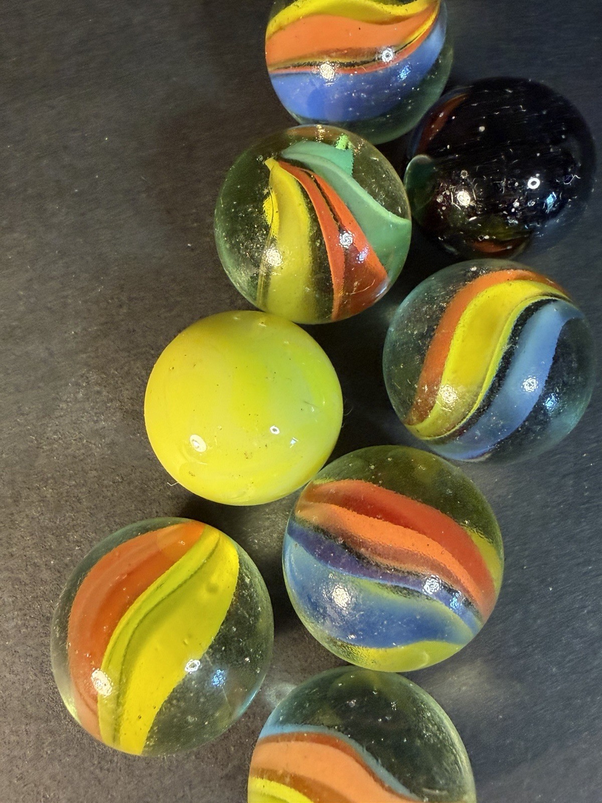 6 Cats Eye 1” Shooter Marbles Plus Two Other Solid Color Marbles