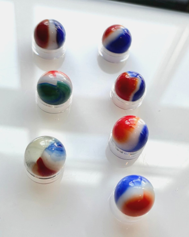 7 VTG Glass Marbles-6 Red White Blue, 1 Red White Green, Approx .57″-.62″ Lot 12