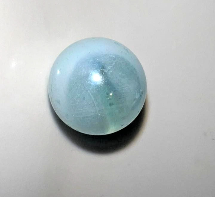 21 vintage handmade glass marbles with colorful swirls and unique patterns.