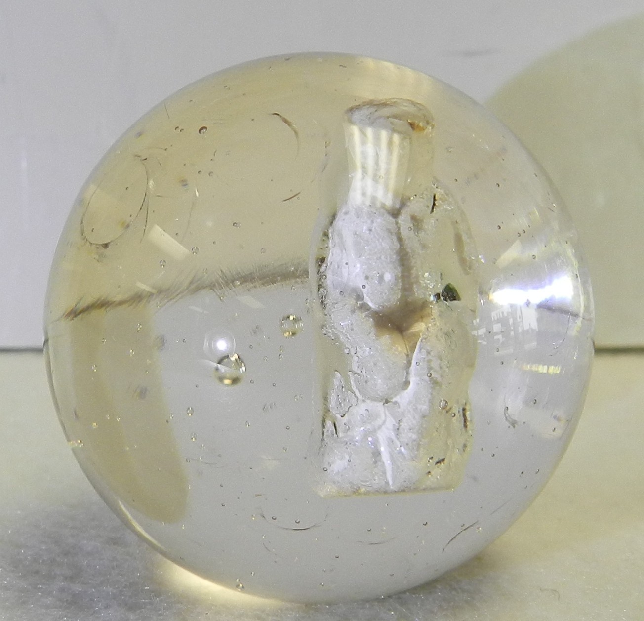 #19621m Child Sitting on Stump Vintage German Handmade Sulphide Marble 1.60 In