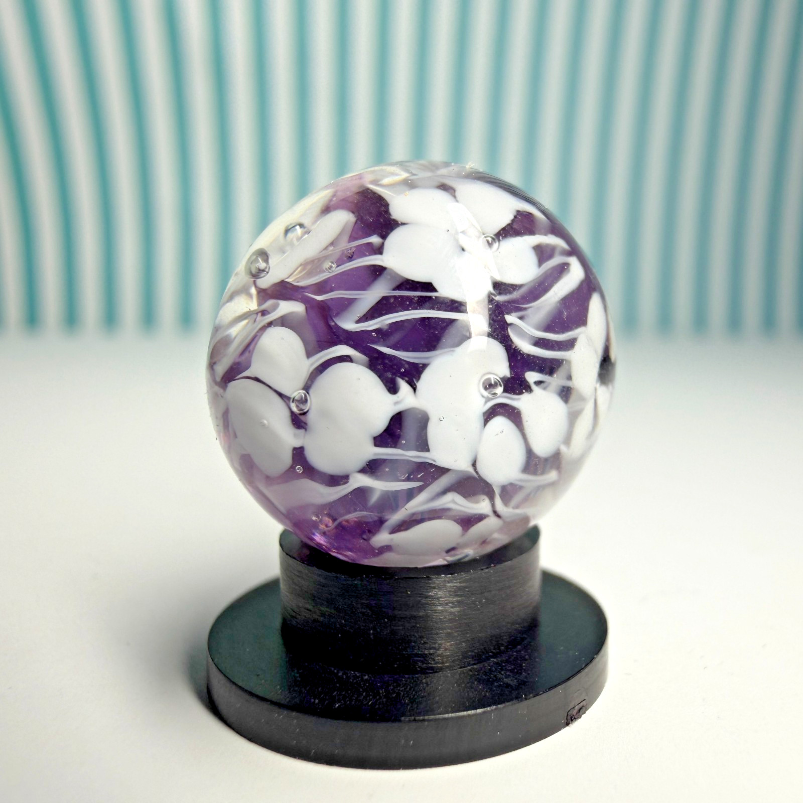 Sweet Ditsy Marble 5/8″ Handmade Glass White Flower Purple Base + Stand