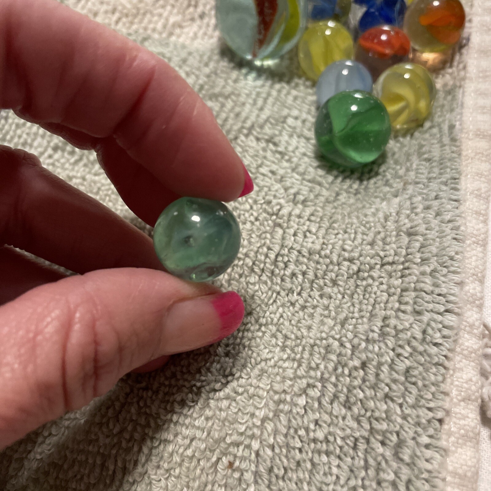 1930-1940’s cat eye 4 vein marbles. Total 12, 1 In, .75 , 10 .50