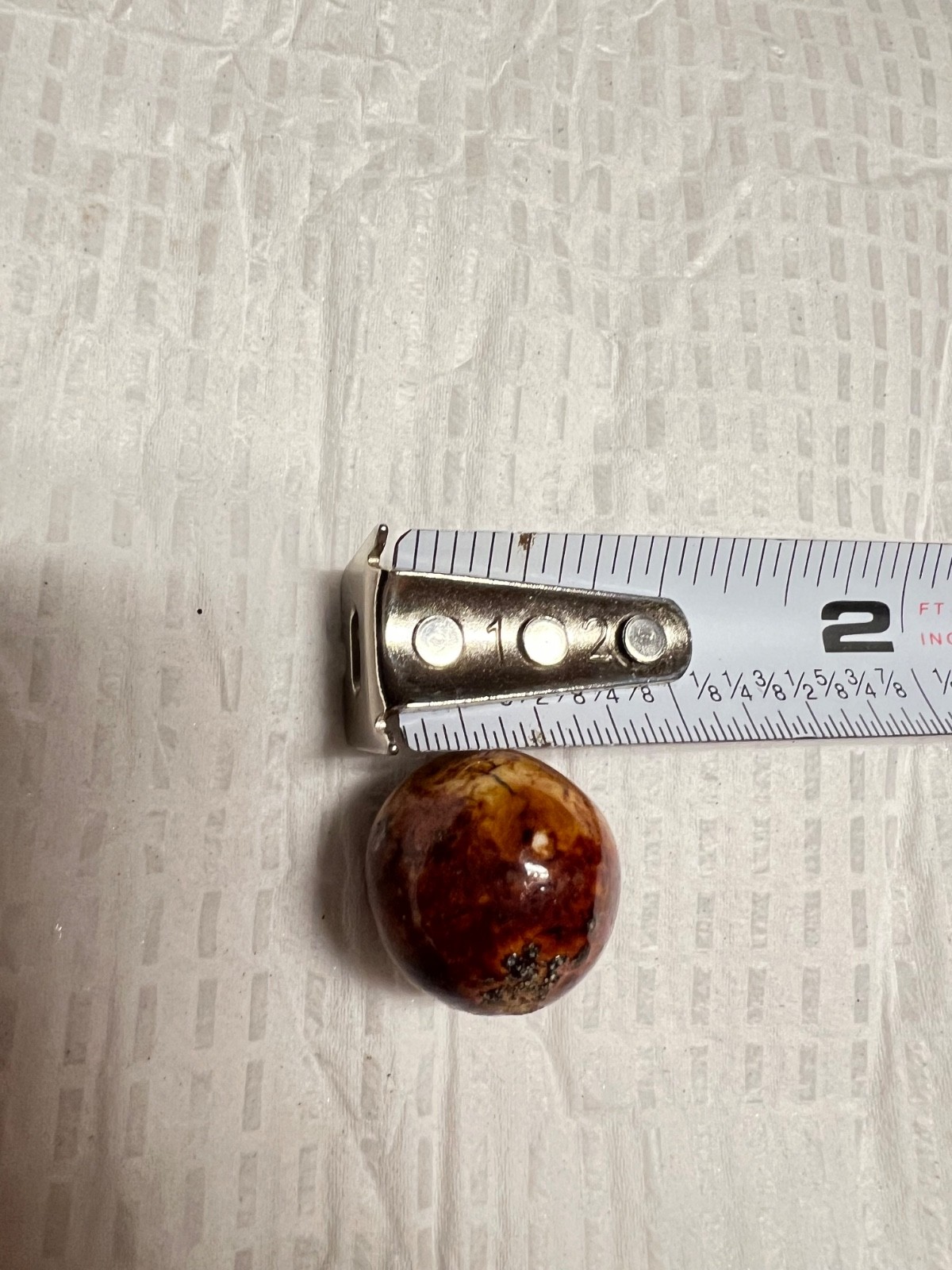 lot of seven bennington marbles, 3 are 1/2 i ch others are smaller 4 brown two b