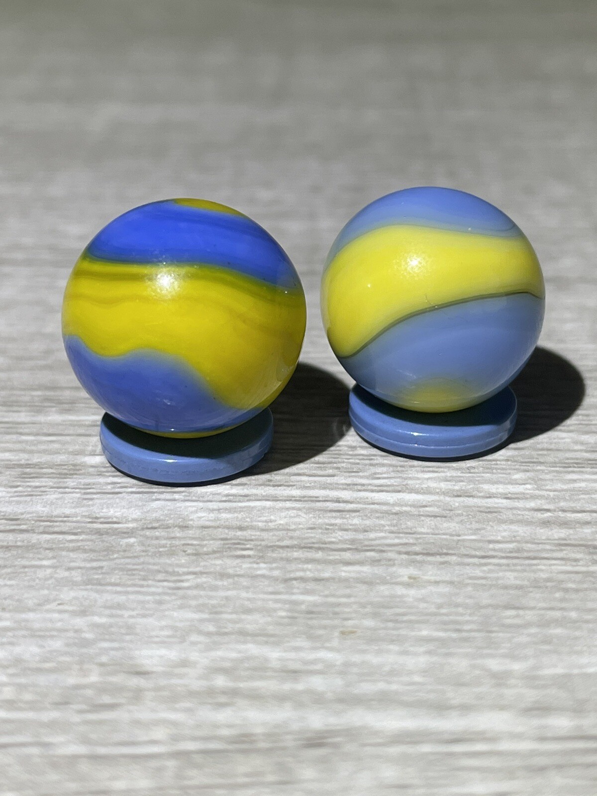 Two Akro Agate Cub Scout Corkscrews Vintage Marbles