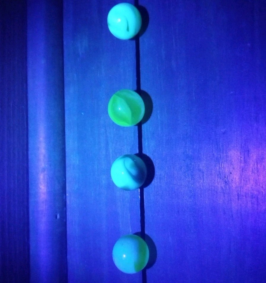 4 Vtg Uranium Glass Swirl Shooters Marbles UV Reactive Blacklight Glow Vaseline