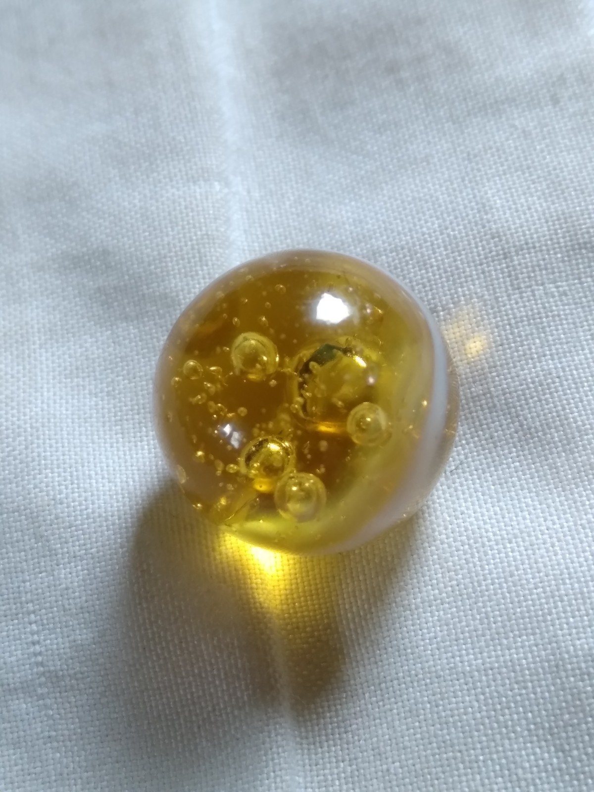 Vintage 9/16″ Yellow Glass Playing Marble.