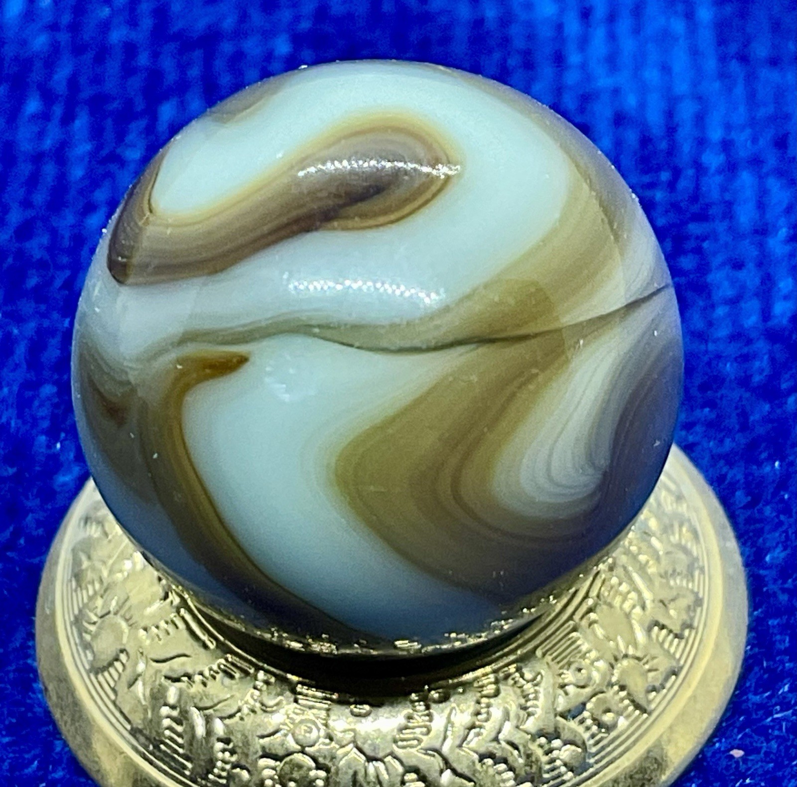 A Vintage Alley Agate “Pistachio” UV Marble. Measures .66” Mint Condition.