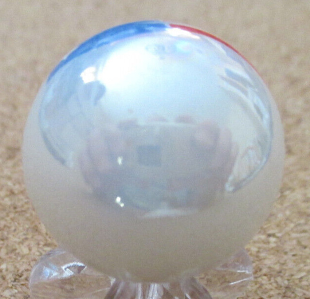 NFL: New England Patriots Logo on a Pearl Jabo Marble #111 .987″ = 25.06mm