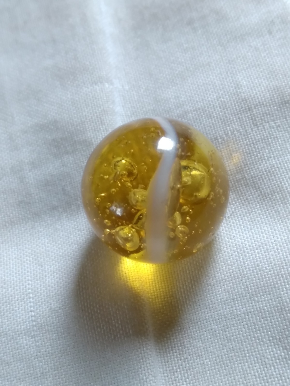 Vintage 9/16″ Yellow Glass Playing Marble.