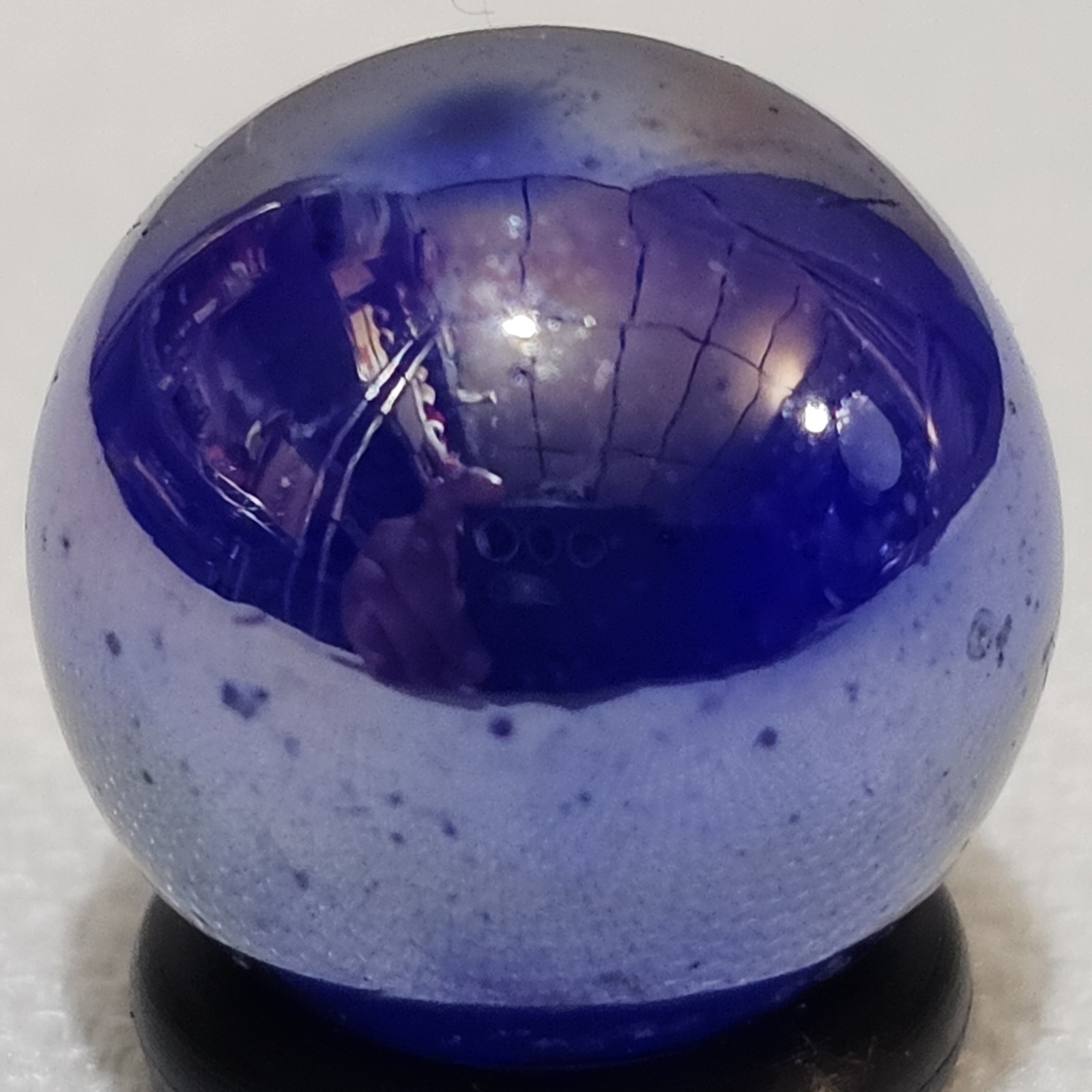 Iridescent Marble Unknown Maker .60 Inch Carnival Marble Blue Base