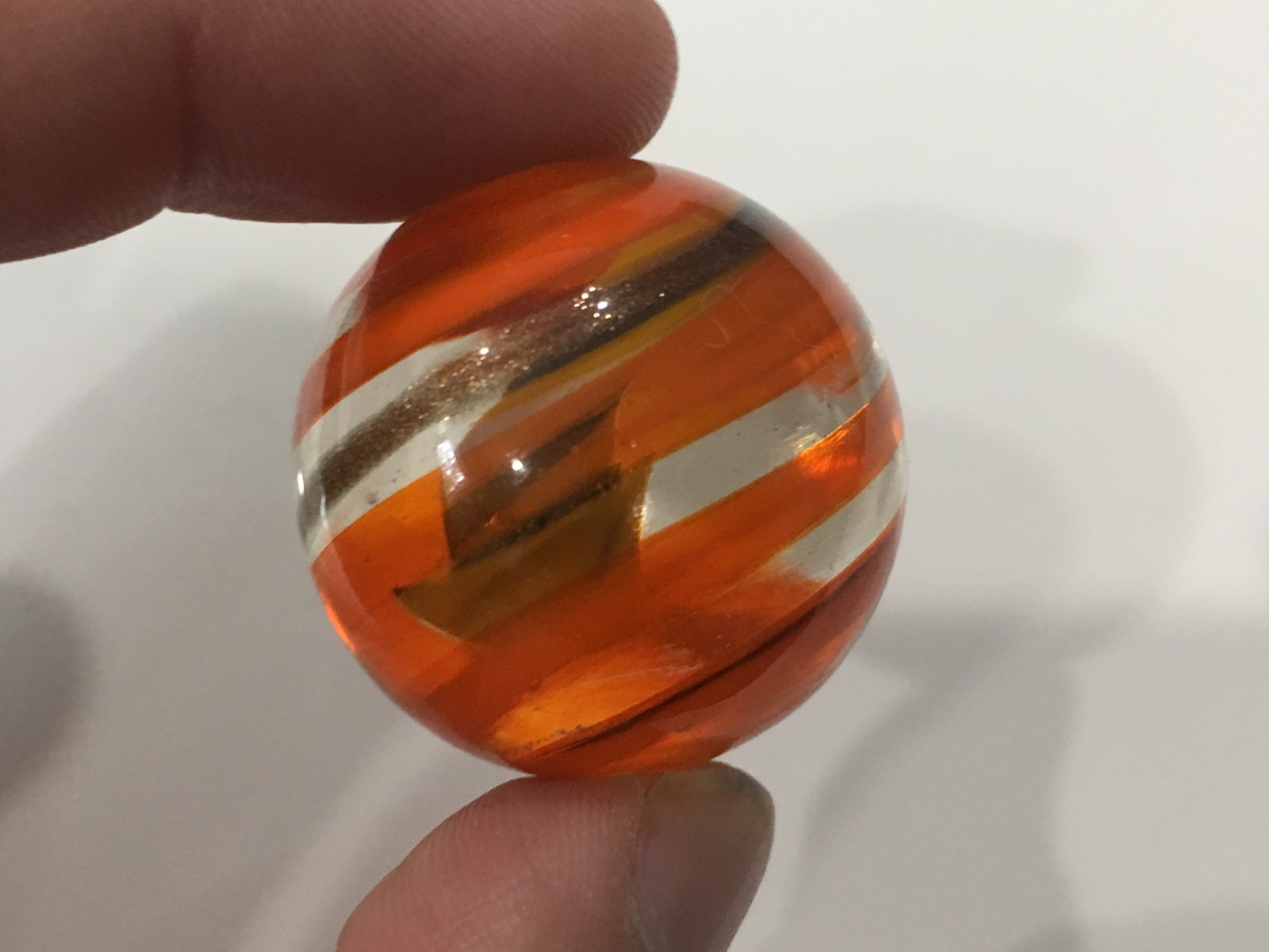 Unknown Age Blown Glass Shooter Marble Orange Gold Swirl