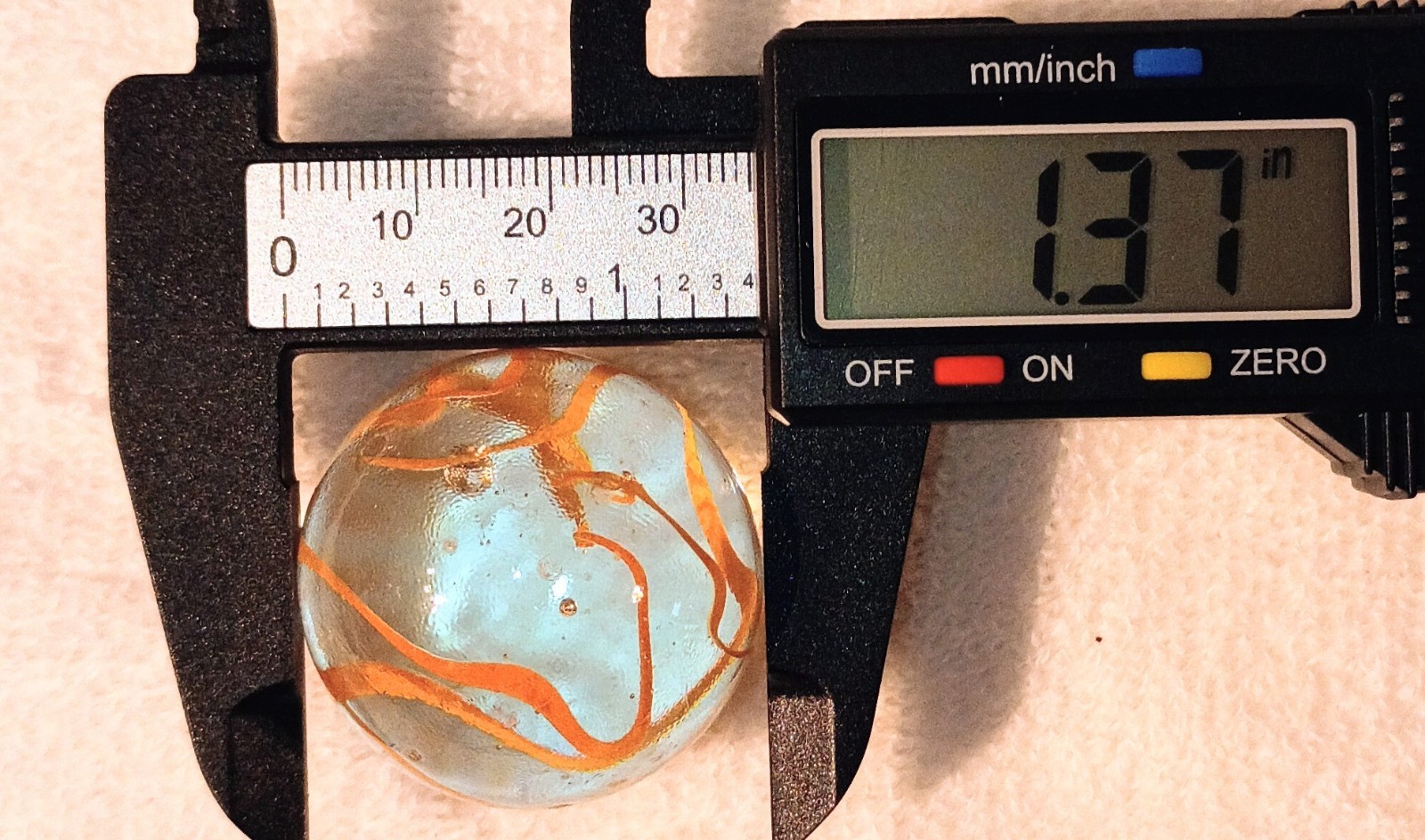 1.36 “Spaghetti” Glass XL Shooter Marbles Pack of 4 Clear w/ Orange Swirls
