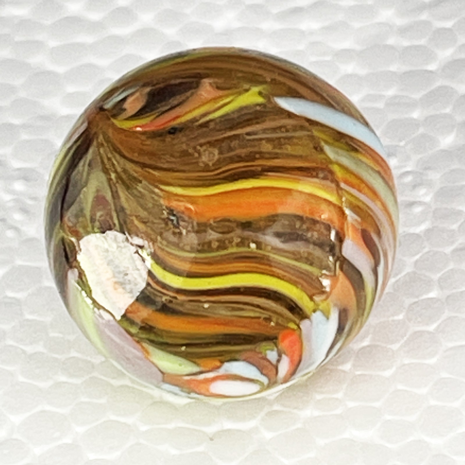 Christensen Agate Company Guinea Clear Base Marble – .660″