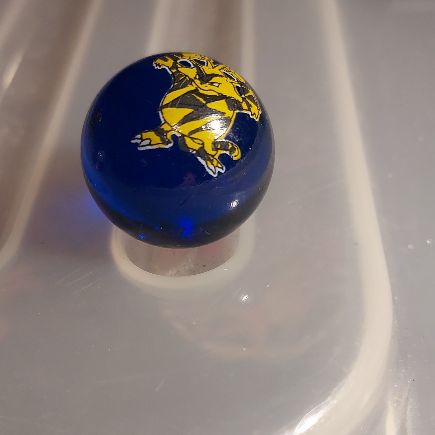 #125 Electabuzz Character Printed Blue Glass Toy Marble – Machine Made