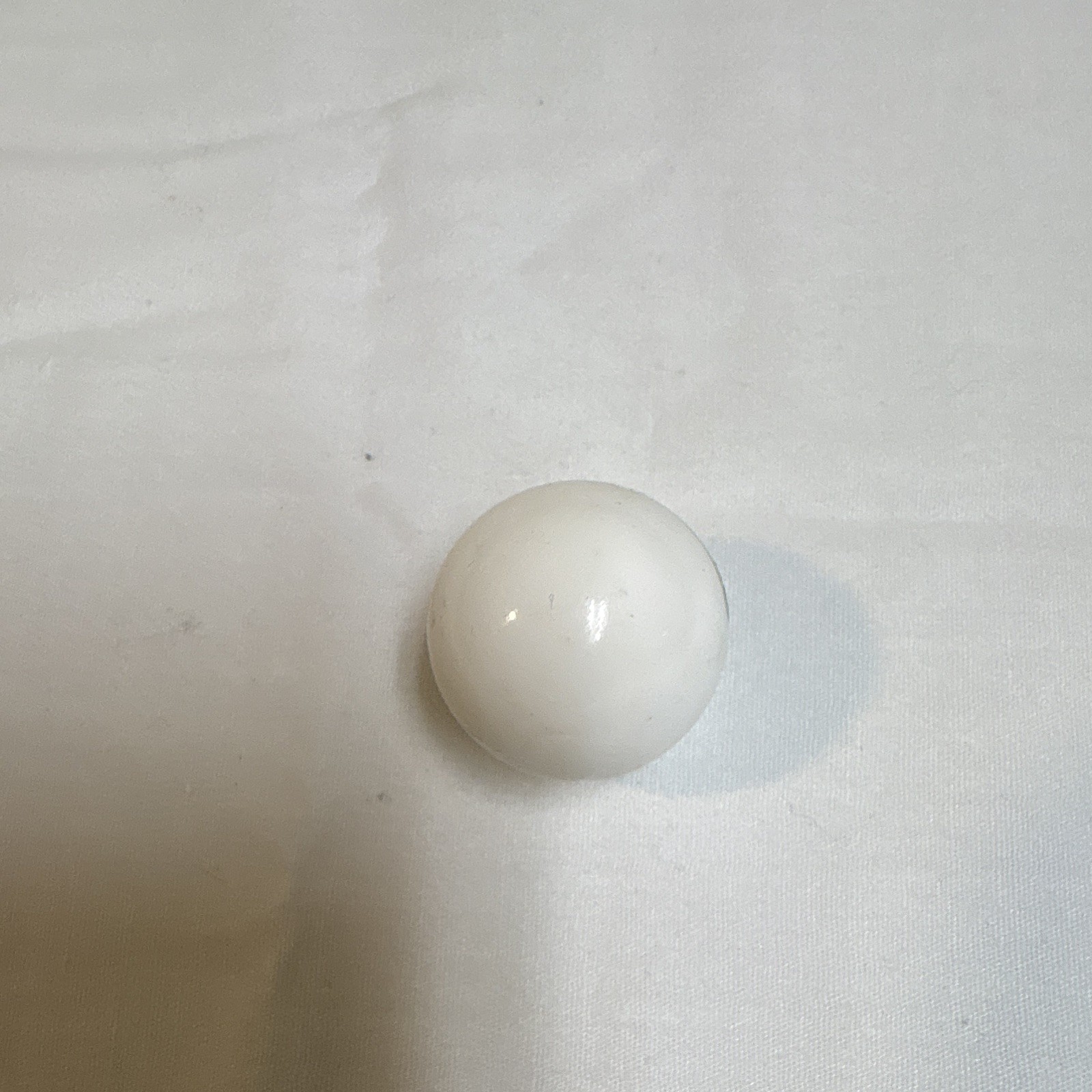 White Logo Printed Toy Marble w/ Green “Remington” Text, Machine Made