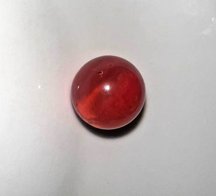21 vintage handmade glass marbles with colorful swirls and unique patterns.