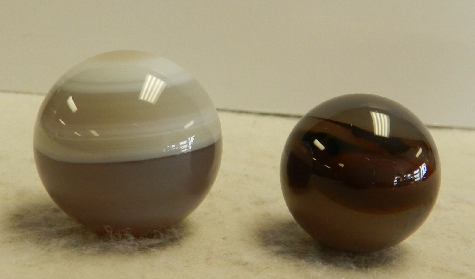 #14085m Machine Made Stone or Agate Shooter Marbles .84 .97 Inches Likely Modern