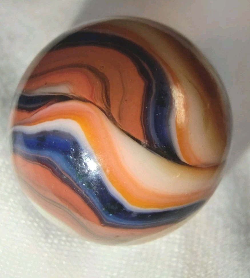 Jabo/DAS Cranberry Busy Gorgeous Flame Swirl Shooter Marble .74 Out Of Round