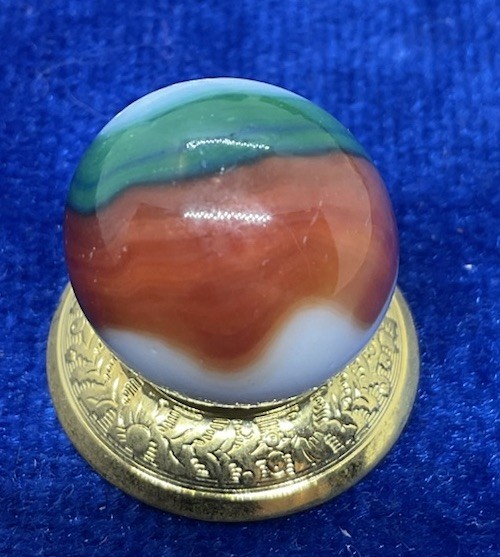 A Vintage Marble King Blended Three Color Marble. Measures .62” Mint Condition.