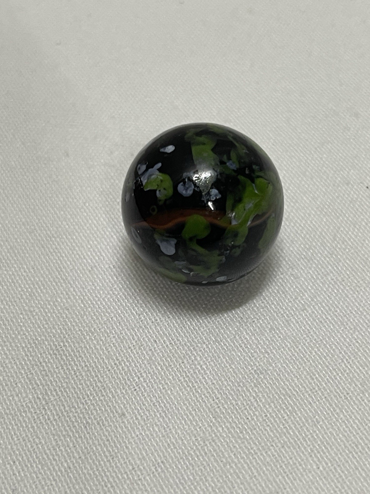 Vintage 0.95” Vacor Planet Glass Marble Shooter Green Black White Speckled