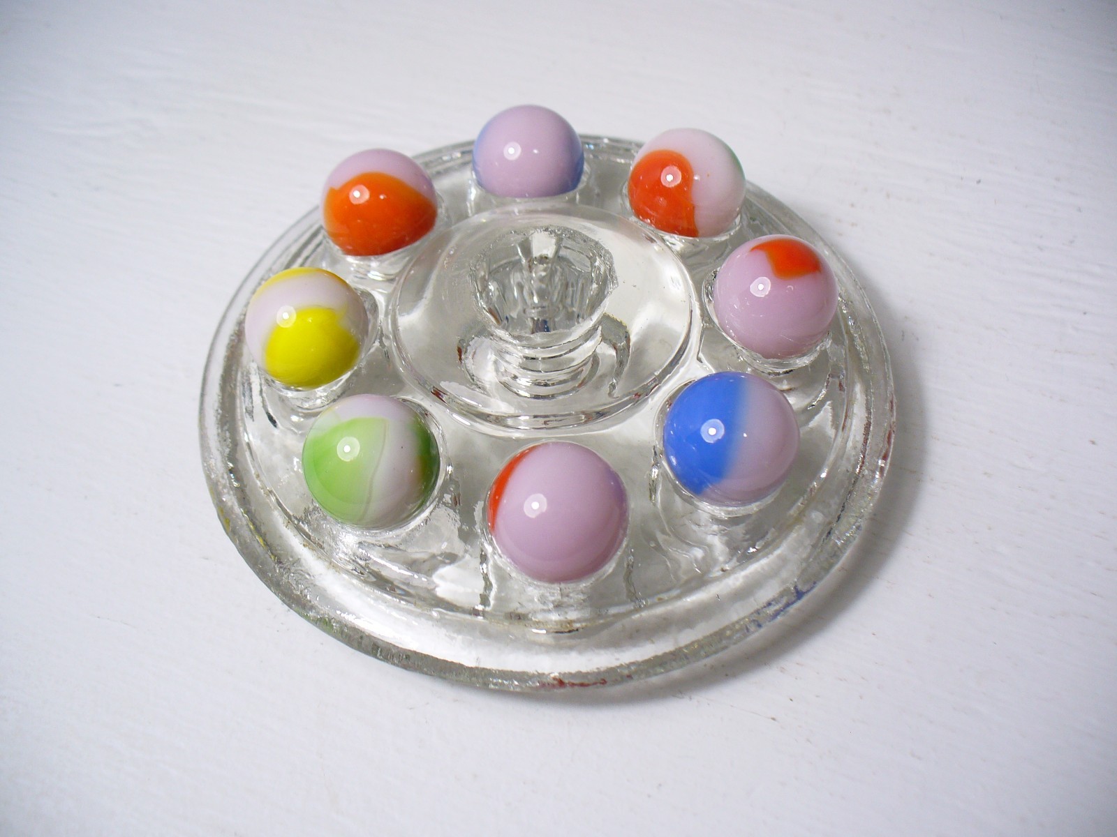 #914 Vintage Marble King Rainbows 8 Pieces all are on a Pink base