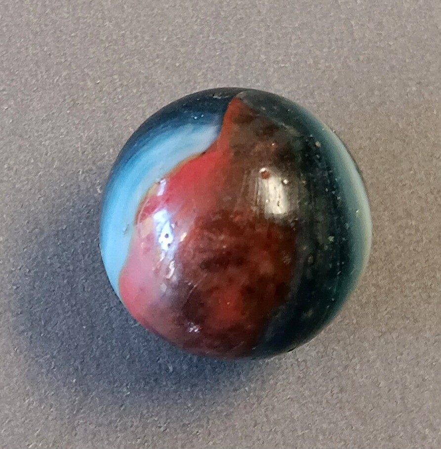 Peltier Miller MCS Rainbow Marble .64″ Clear Dark Trans Blue Base – Red & White