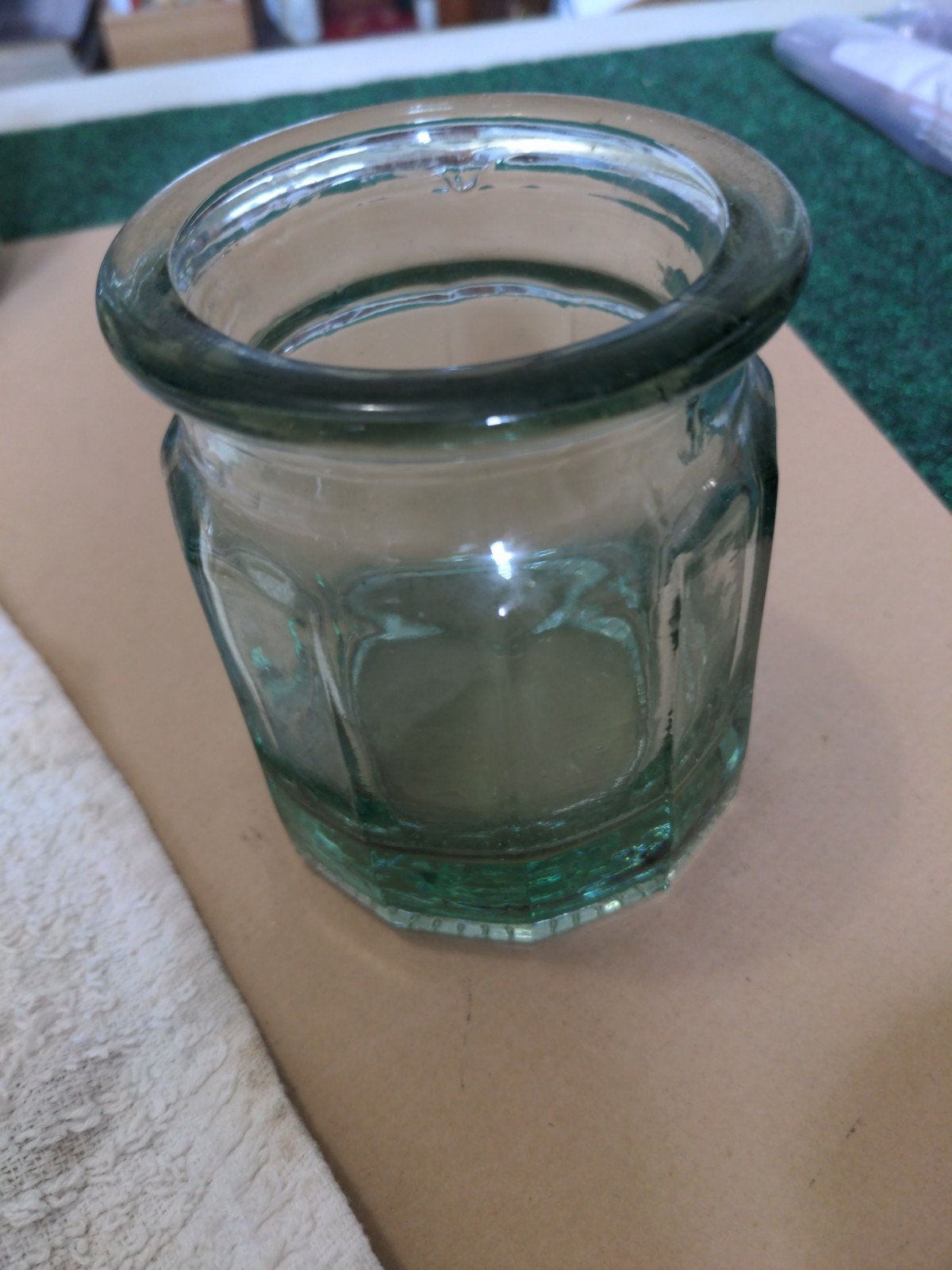 aprox. 50 cat eye marbles with 2 shooters in vintage glass bottle