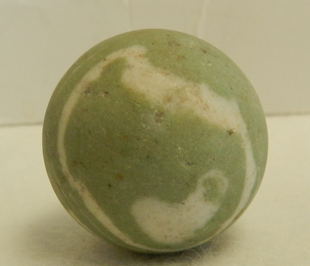 #20304m Vintage Error Out of Round Lined Crockery Shooter Marble 1.20 Inches