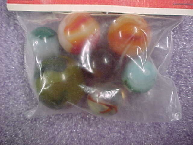 Bag of Coca Cola 43 Annual Tournament marbles.New old stock see photos